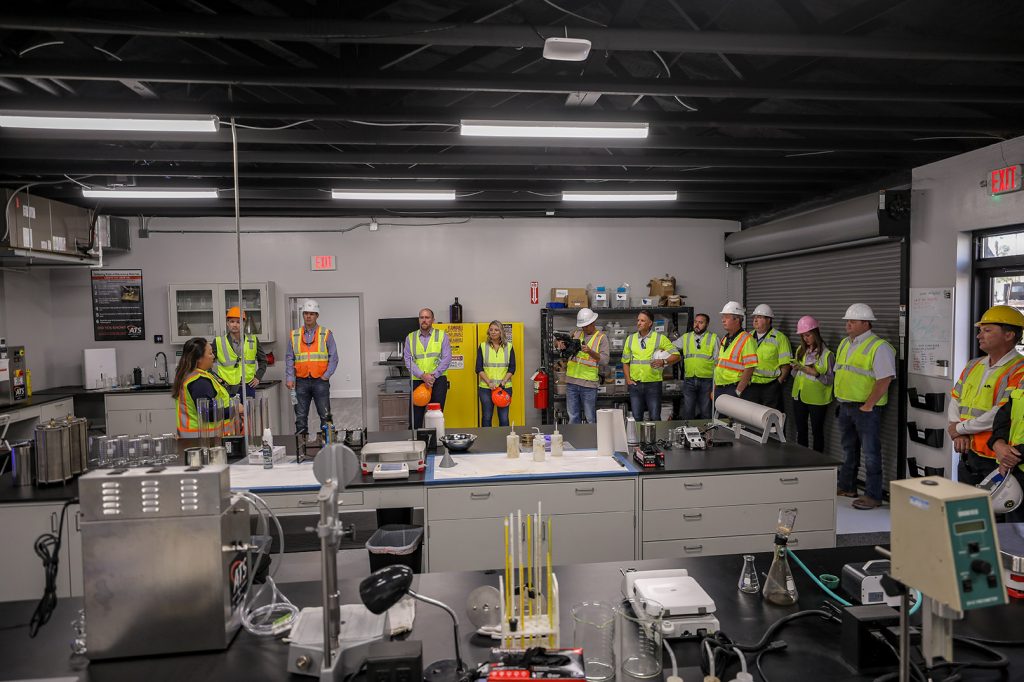 Members from FDOT, Duval Asphalt, ATS, Hubbard, Preferred Materials and ACAF tour the ATS Binder Testing Lab in Jacksonville, Florida.