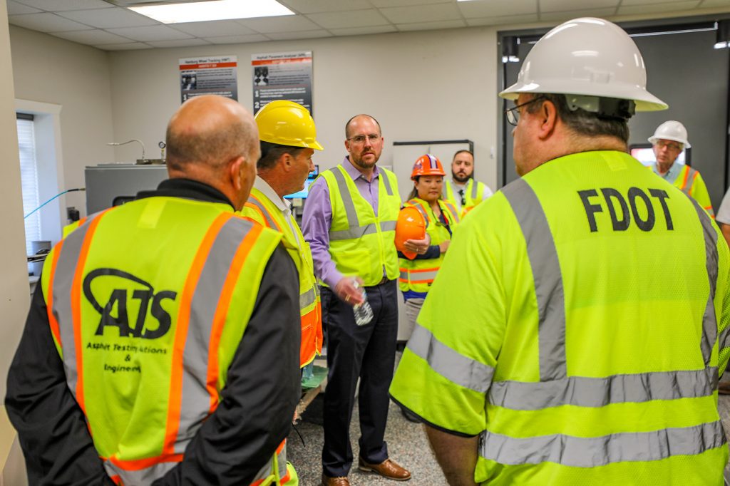 Members from FDOT, Duval Asphalt and ATS, tour the ATS Performance Testing Lab in Jacksonville, Florida.
